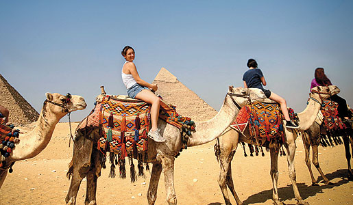 Enjoy riding camels with the whole family!