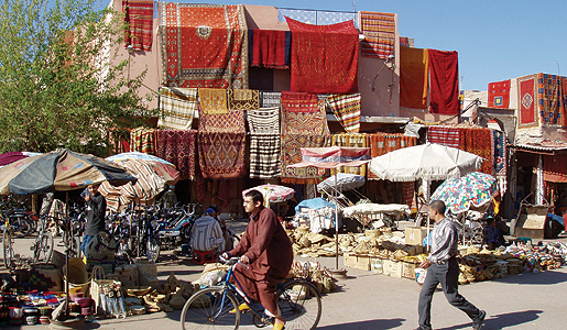 Moroccan textiles to be sold at a town market.