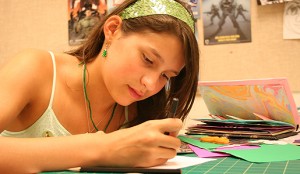 A child works on a photography project at the Smithsonian Institution.